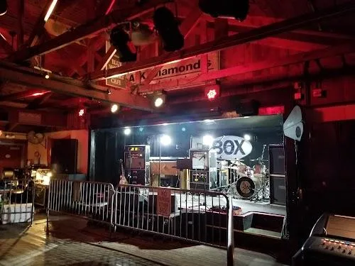 The stage at the Chicken Box on Nantucket, lit red before a show